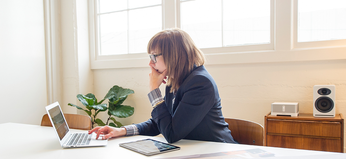 Woman working out household sums