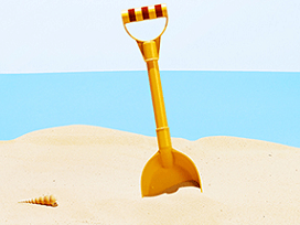 Bucket and spade on beach