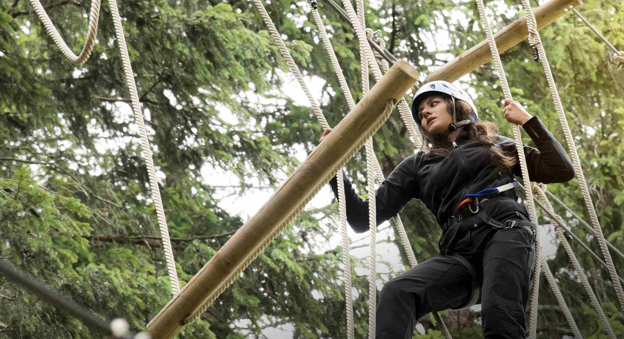 A woman completing an obstacle course