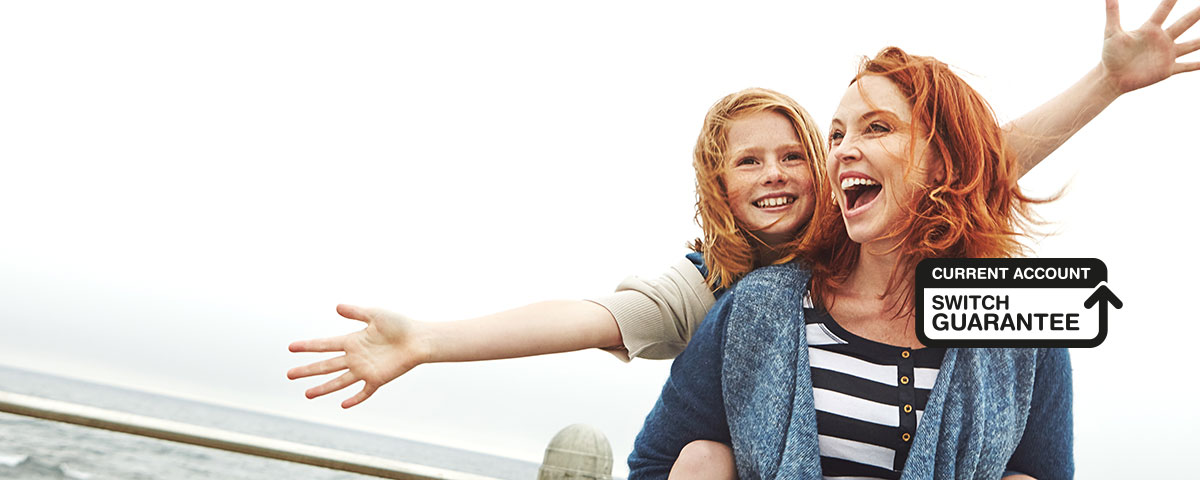 Image of a mum and a daughter with outstretched arms smiling