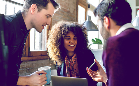 Three friends over coffee